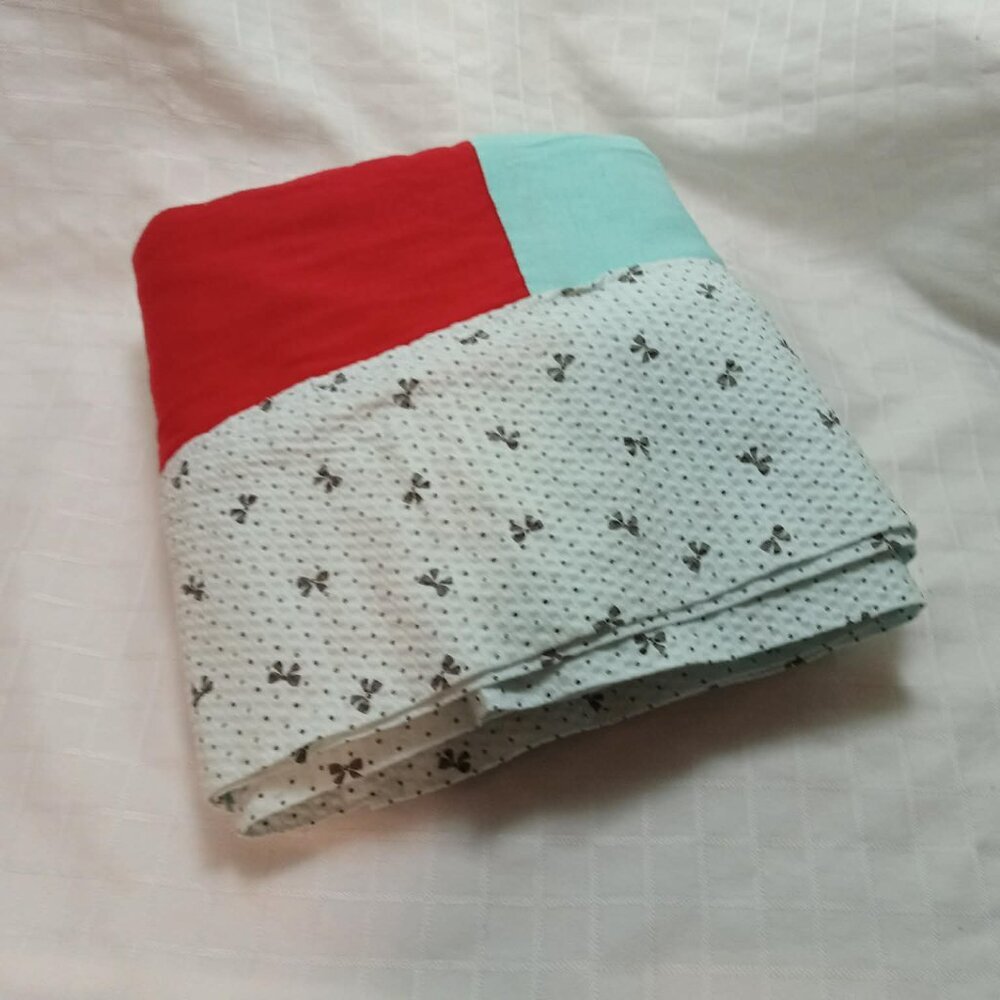 Handmade very soft blanket made from a blend of cotton and spandex 38 x64 inches